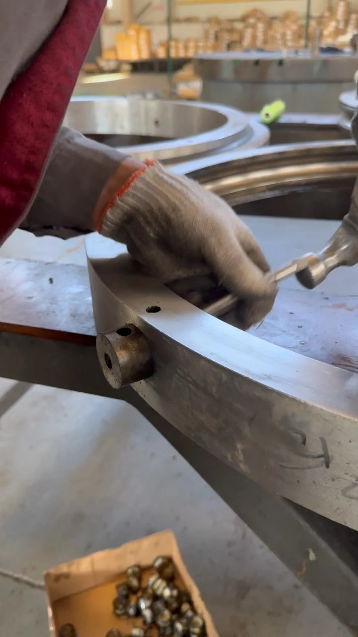 This is the mounting hole of the slewing bearing, and the steel ball or roller is loaded into…