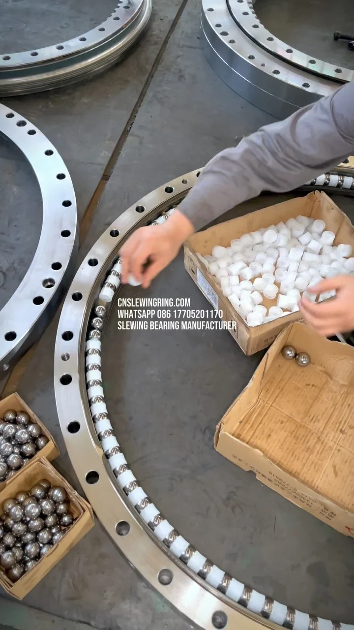 Silver metal balls, black metal raceways, mixed with golden grease. Yeah, we love life and these big guys!