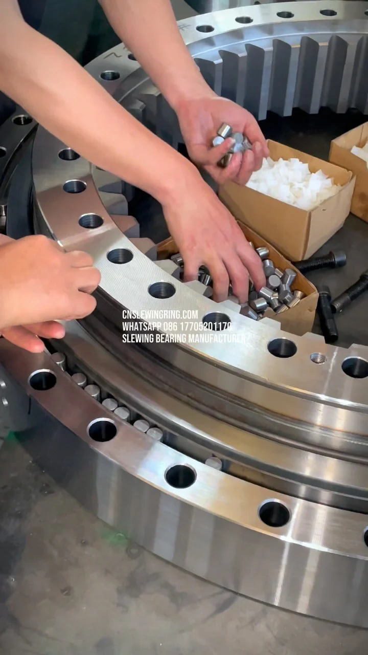 Three rows of roller structure slewing bearing. We are installing the rollers for the middle layer.