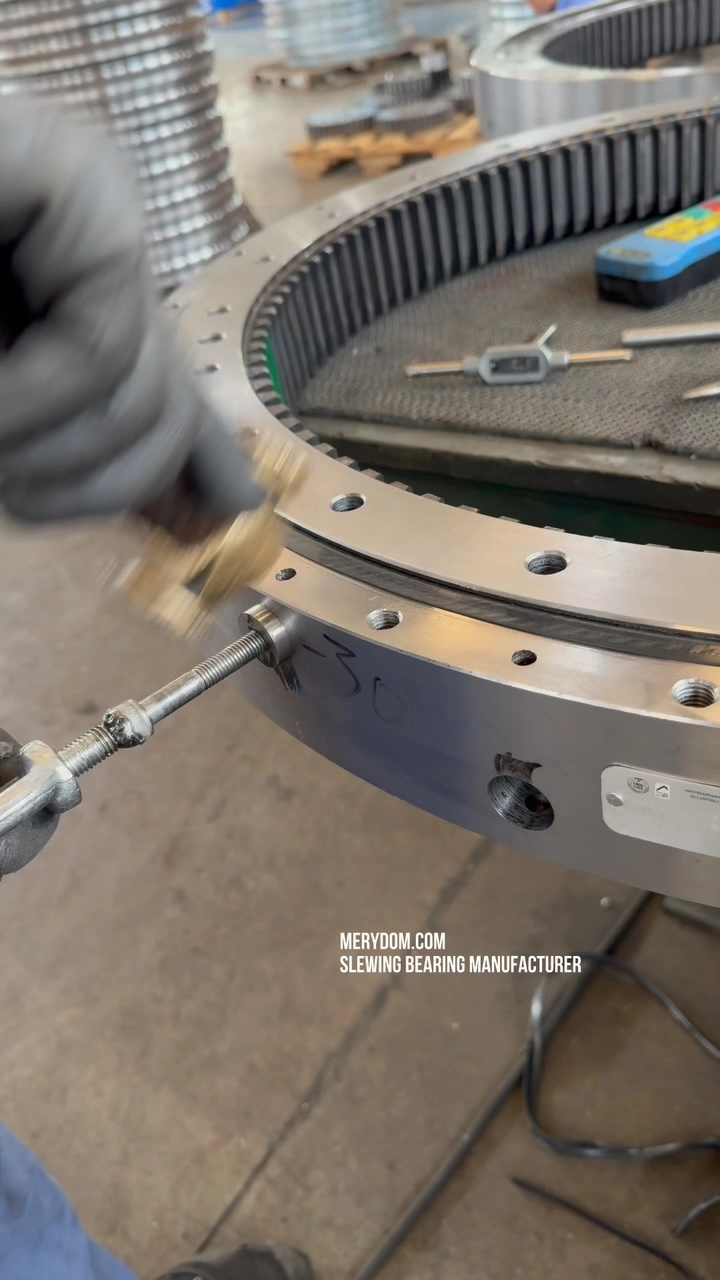 Inside a Slewing Bearing: How Engineers Inspect and Maintain a Double Row Ball Bearing. MERYDOM.COM SLEWING BEARINGS MANUFACTURING…